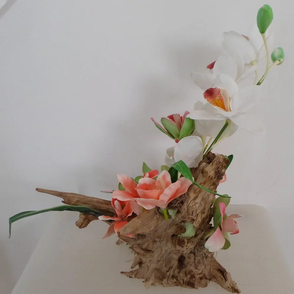 Fabric Orchids on a Tree Trunk Floral Arrangement
